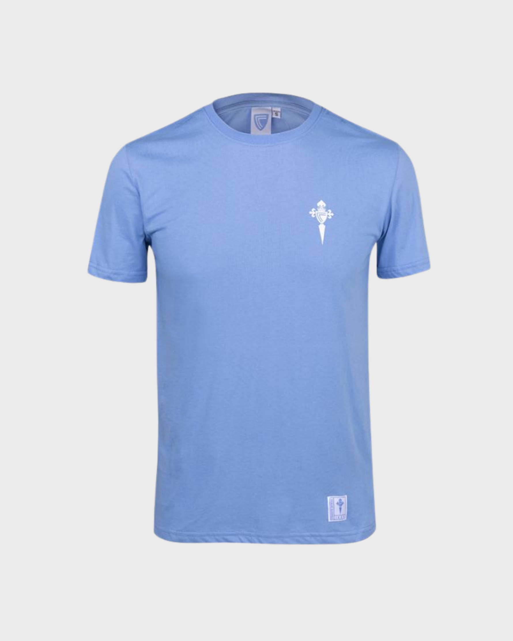 Foto de producto Camiseta Celeste Home Escudo Branco Disponible en la Tienda del Celta FC