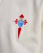 Chaqueta Branca Infantil Paseo Xogador 26/27 Disponible en la Tienda del Celta FC